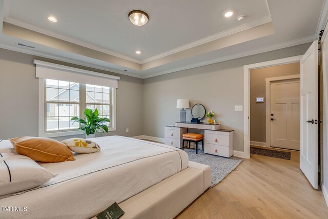 262 Harps Ln, Gray, TN 37615 - bedroom with light wood-type flooring, crown molding, a raised ceiling, recessed lighting, and baseboards