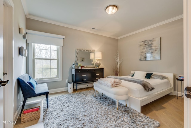 262 Harps Ln, Gray, TN 37615 - bedroom with crown molding, wood finished floors, and baseboards