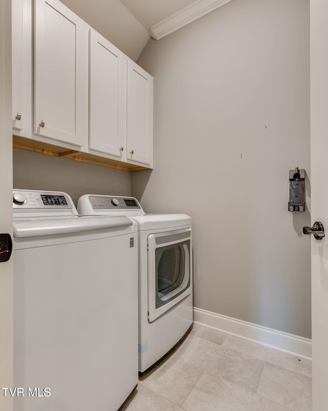 262 Harps Ln, Gray, TN 37615 - laundry room with washing machine and dryer, cabinet space, baseboards, and crown molding