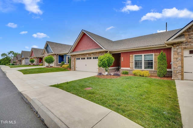 262 Harps Ln, Gray, TN 37615 - view of front of house with concrete driveway, an attached garage, board and batten siding, and a front yard