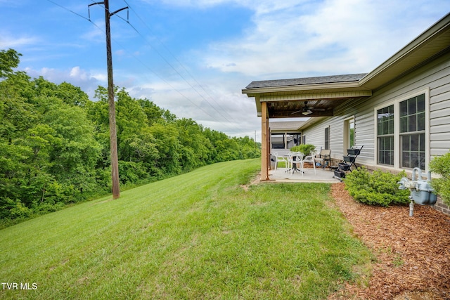 262 Harps Ln, Gray, TN 37615 - view of grassy yard with ceiling fan and a patio area