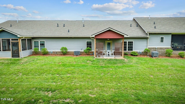 262 Harps Ln, Gray, TN 37615 - back of property featuring a sunroom, roof with shingles, a patio area, a yard, and central AC