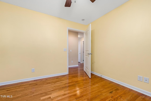 unfurnished room featuring ceiling fan and light hardwood / wood-style flooring