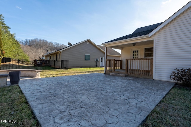 exterior space with a lawn and a patio area