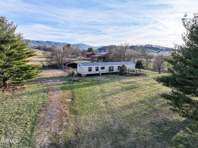 drone / aerial view with a rural view and a mountain view