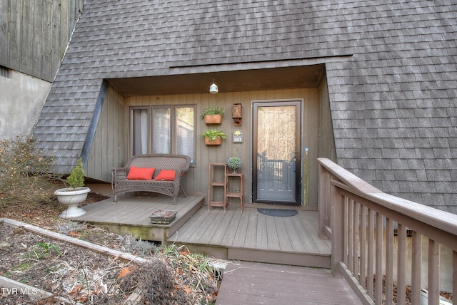 entrance to property with a wooden deck