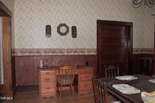 dining area with dark hardwood / wood-style flooring