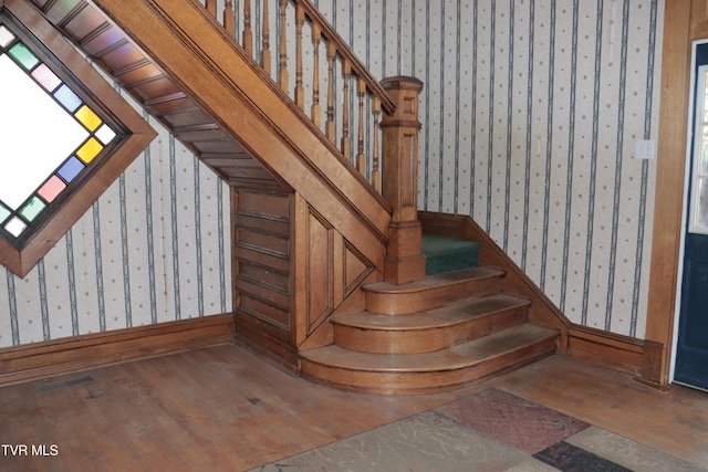 stairway with wood-type flooring