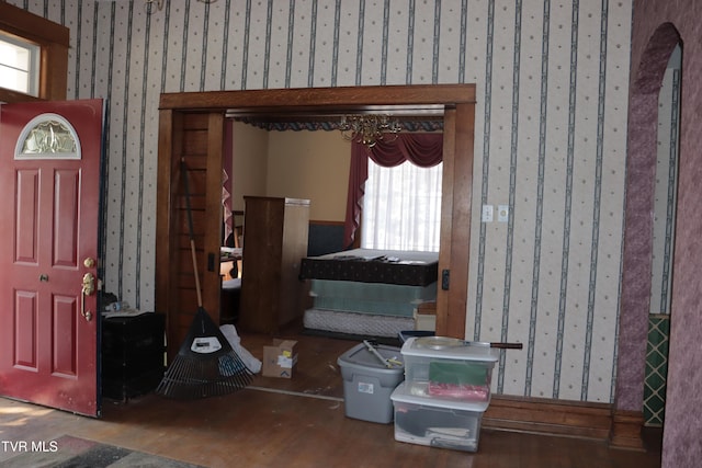 entryway with wood-type flooring