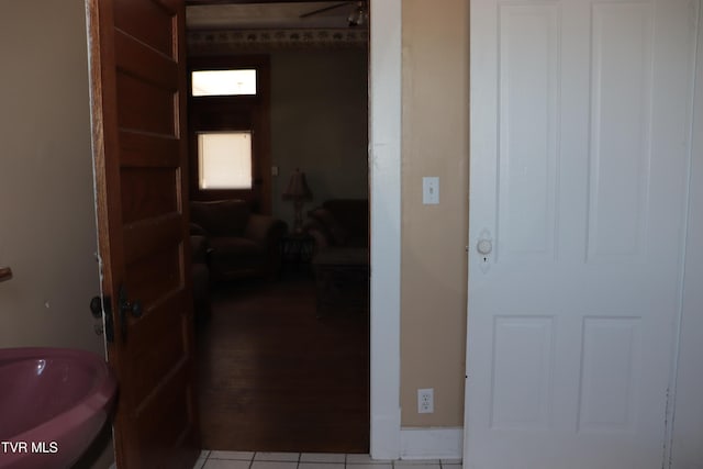 bathroom with tile patterned floors