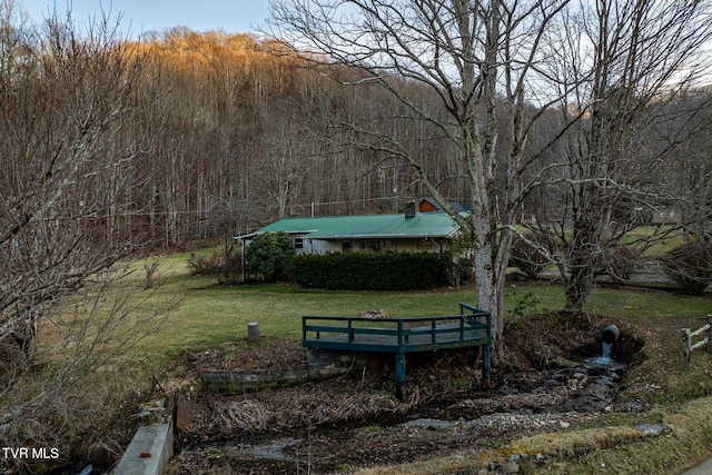 view of community featuring a lawn