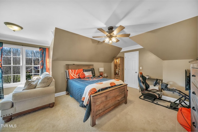 bedroom featuring light carpet, vaulted ceiling, baseboards, and crown molding