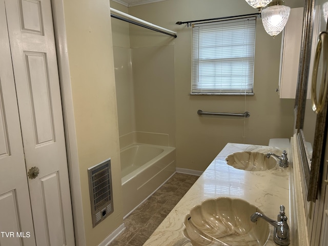 bathroom with vanity, shower / bath combination, and heating unit