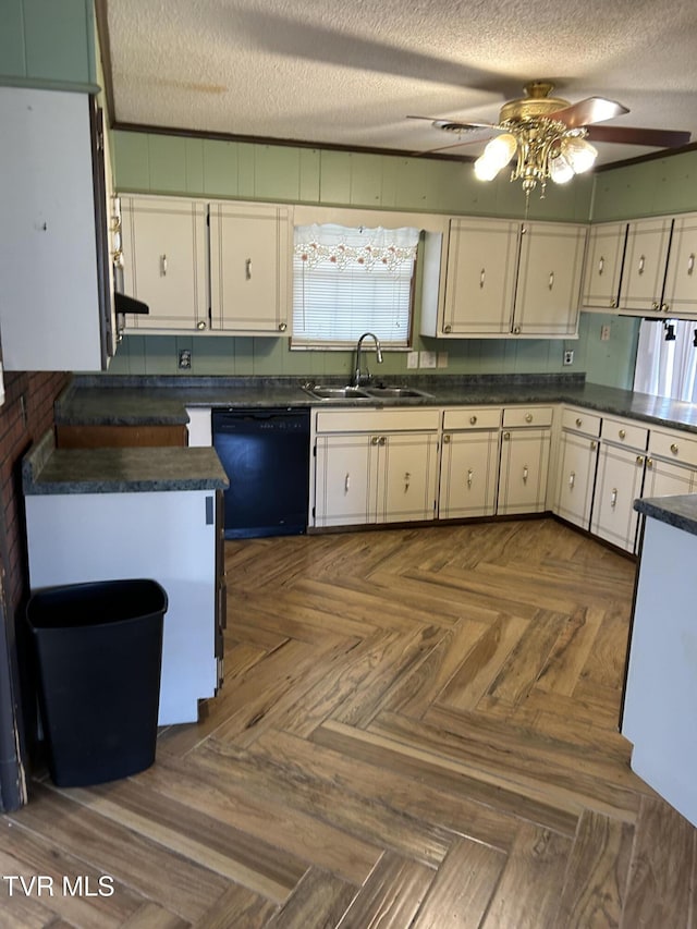 kitchen with dark parquet flooring, sink, a textured ceiling, black dishwasher, and white cabinets