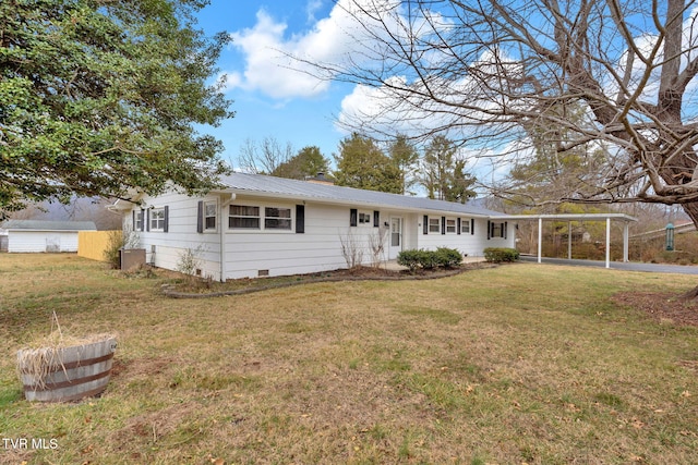 ranch-style home featuring a carport and a front yard