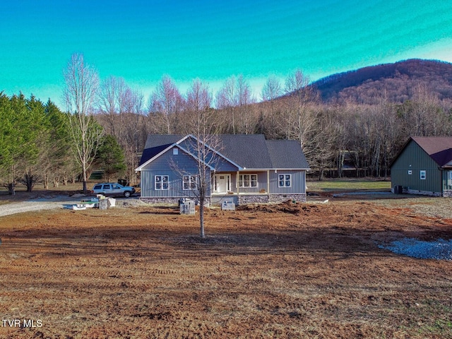 view of front of home with a mountain view