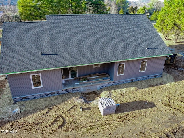 view of front facade featuring a patio and central AC