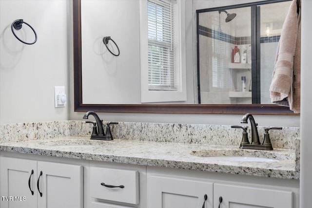 bathroom featuring vanity and walk in shower