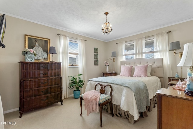 bedroom with a notable chandelier, light colored carpet, crown molding, and baseboards