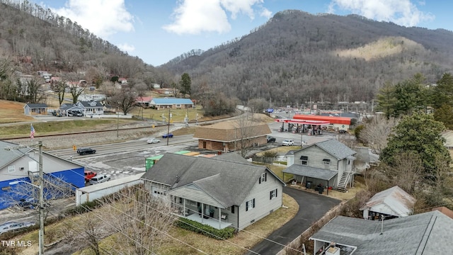 drone / aerial view featuring a mountain view