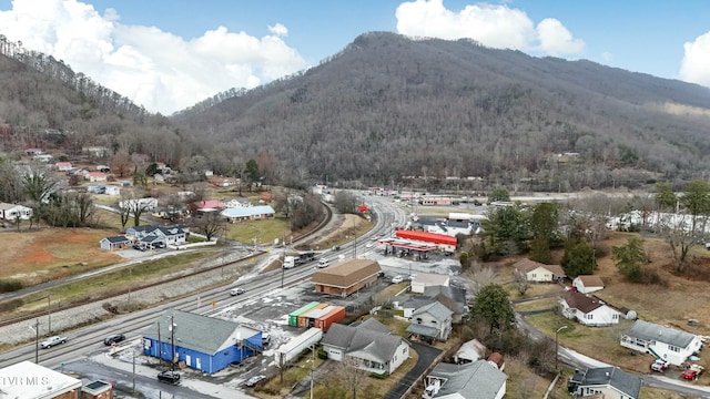 drone / aerial view featuring a mountain view