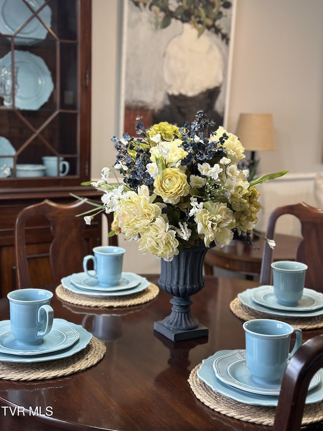 dining space featuring hardwood / wood-style floors