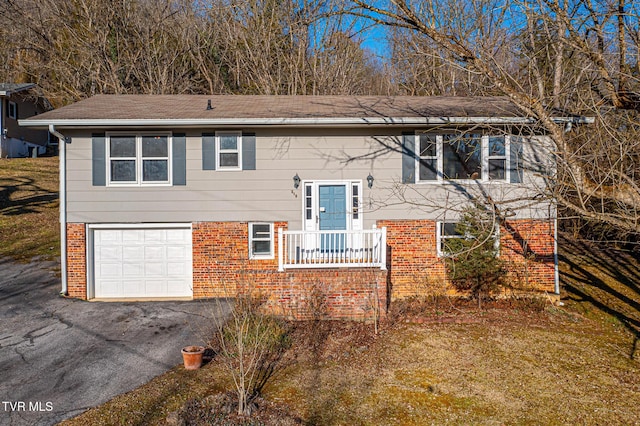 bi-level home featuring a garage