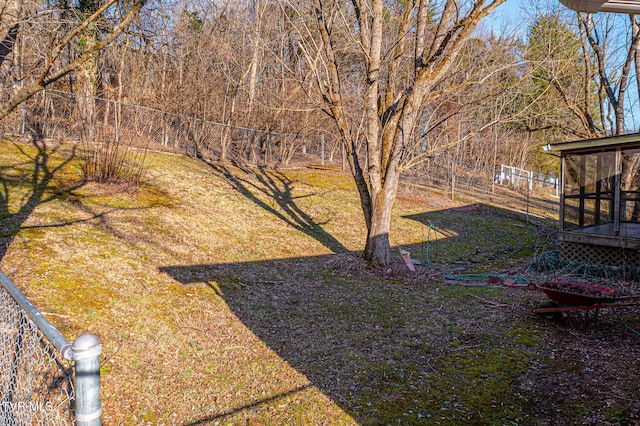 view of yard with a sunroom