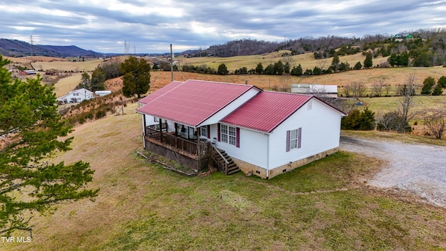 bird's eye view with a rural view and a mountain view