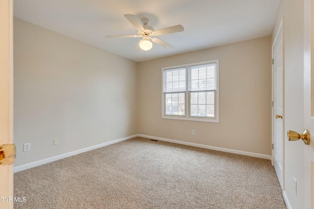 carpeted empty room with ceiling fan