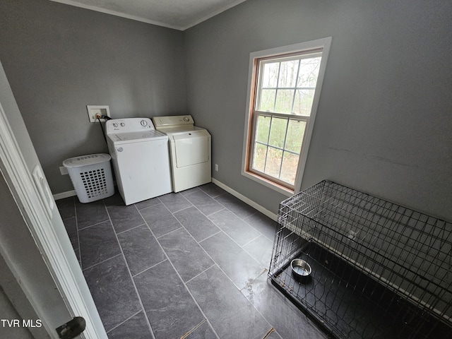 laundry room featuring washing machine and clothes dryer