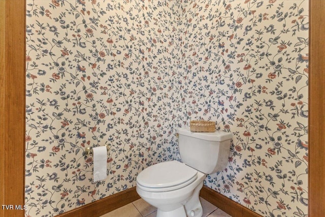 bathroom with tile patterned floors and toilet