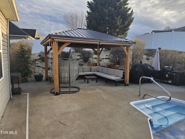 view of patio / terrace with a gazebo, a grill, and outdoor lounge area