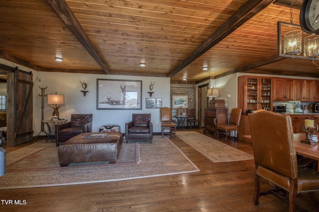 living room featuring wood finished floors, wooden ceiling, beamed ceiling, and a barn door