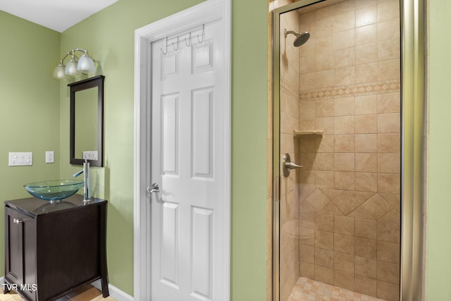 bathroom with vanity and walk in shower