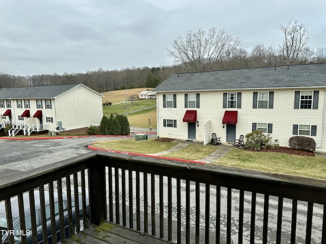 deck featuring a lawn