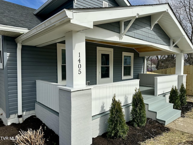 doorway to property featuring a porch