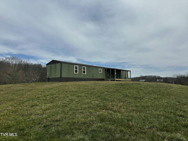 view of front of home with a front yard