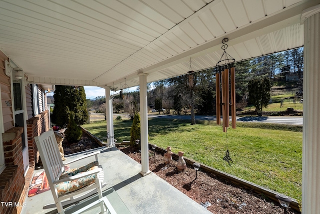 view of patio featuring a porch