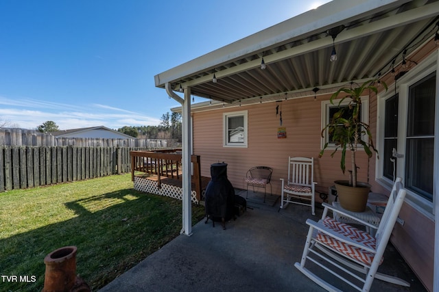 view of patio with fence