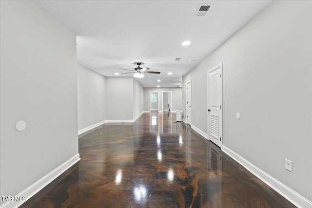 spare room featuring ceiling fan