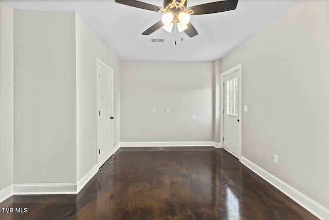 empty room featuring ceiling fan