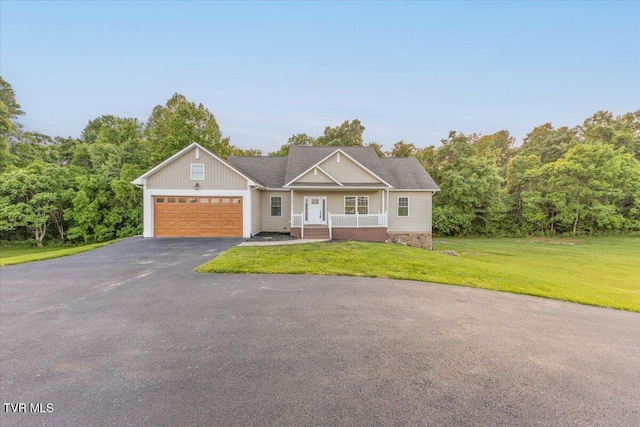 125 Forsyth Ln, Jonesborough, TN 37659 - view of front of property with a garage, asphalt driveway, a front yard, and covered porch