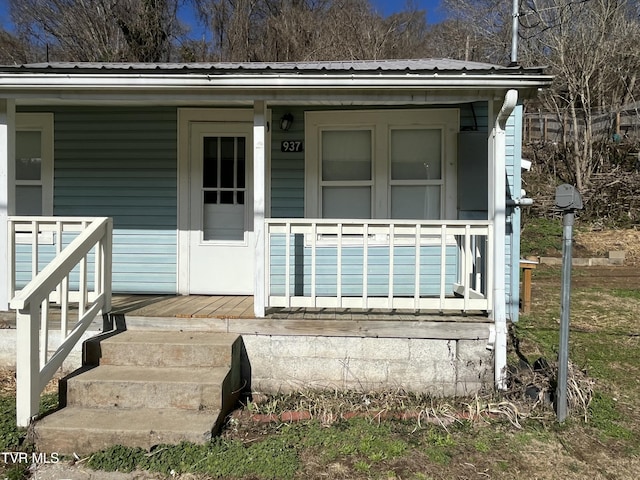 entrance to property with covered porch