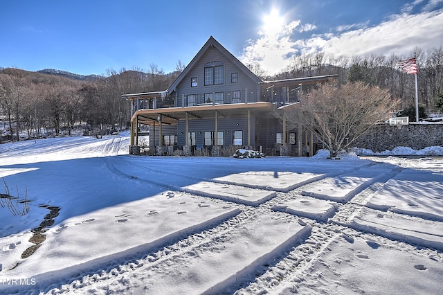 view of snow covered property