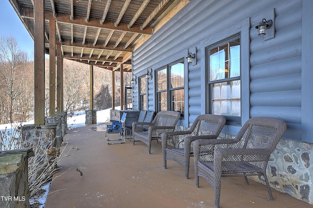 view of snow covered patio