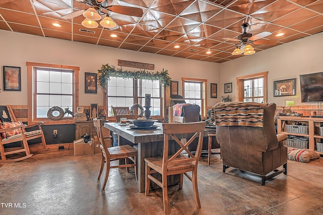 dining room featuring ceiling fan