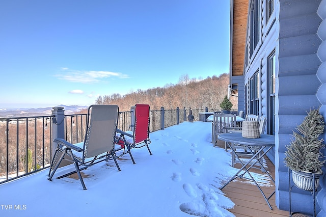 view of snow covered deck