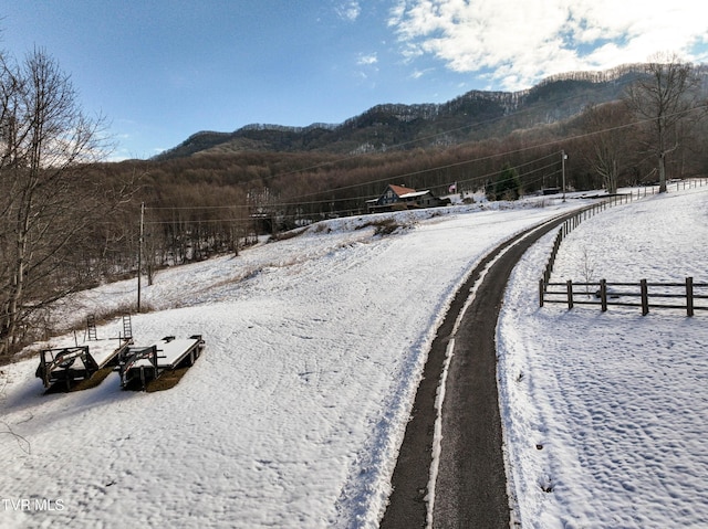 view of mountain feature with a rural view