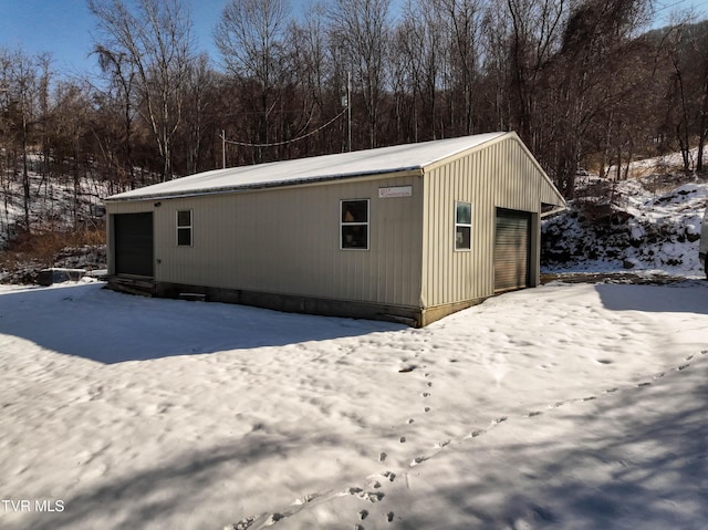 exterior space with a garage